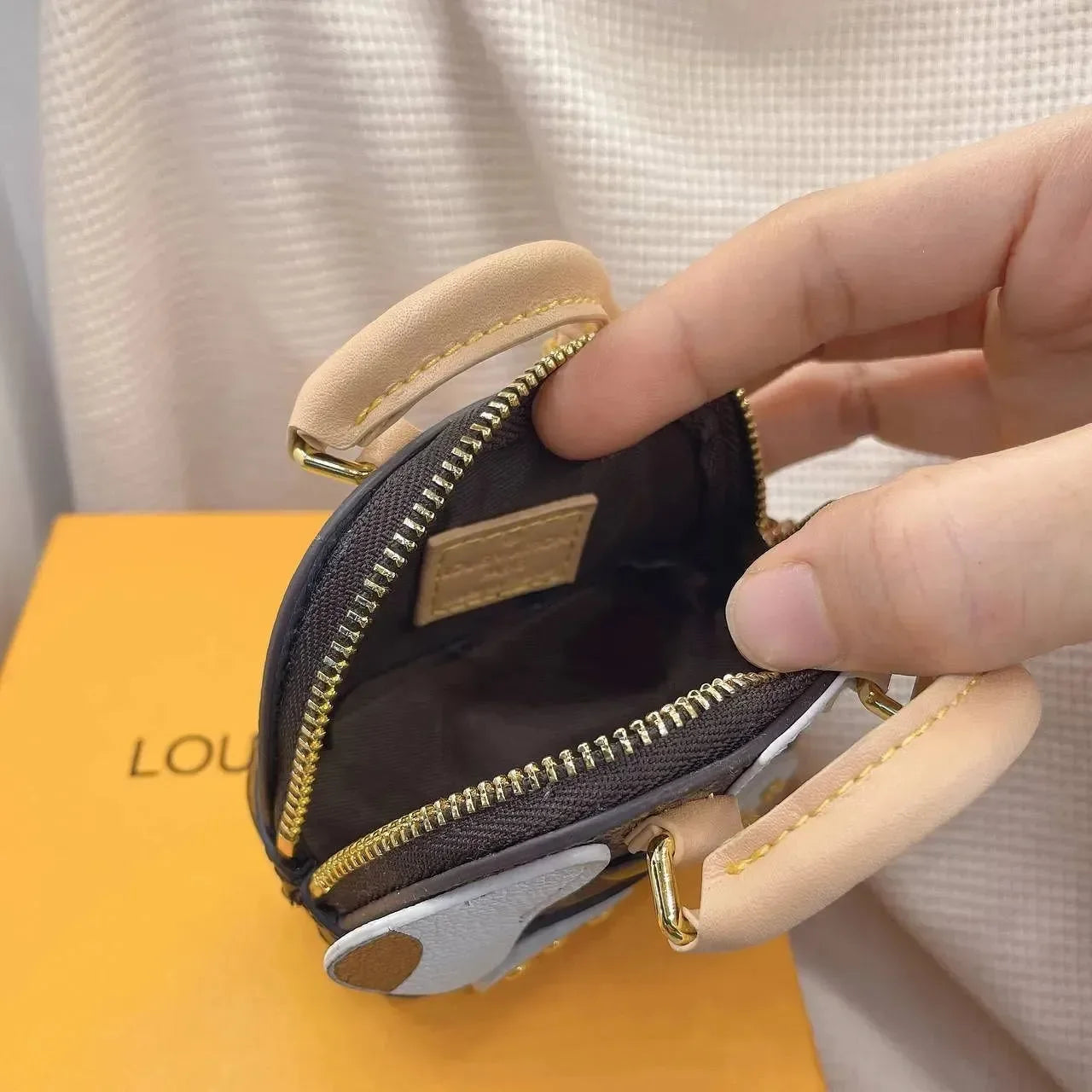 Monogram Luxe Stow Away Mini Bag