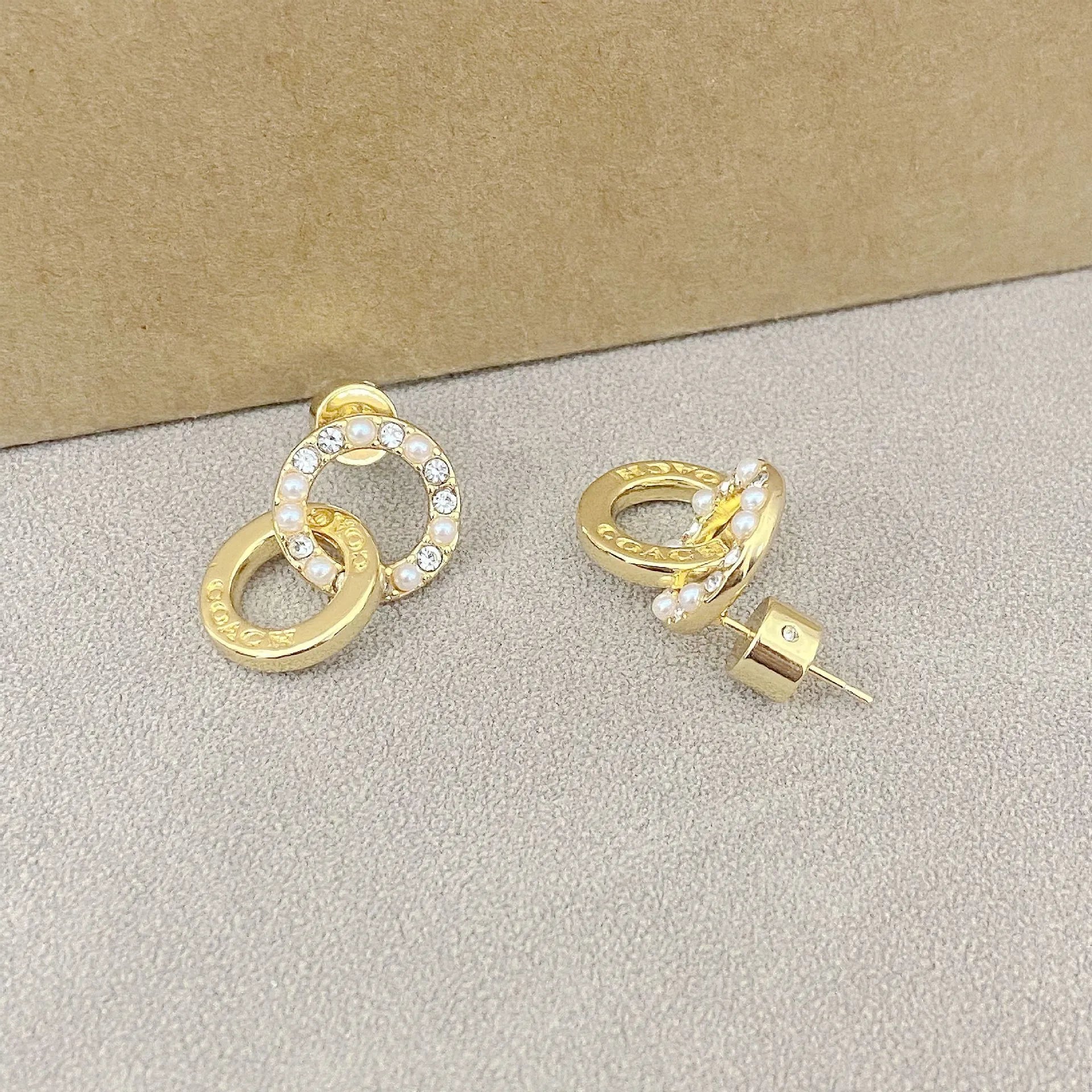 Trainer Luxe Eternity Interlocking Earrings