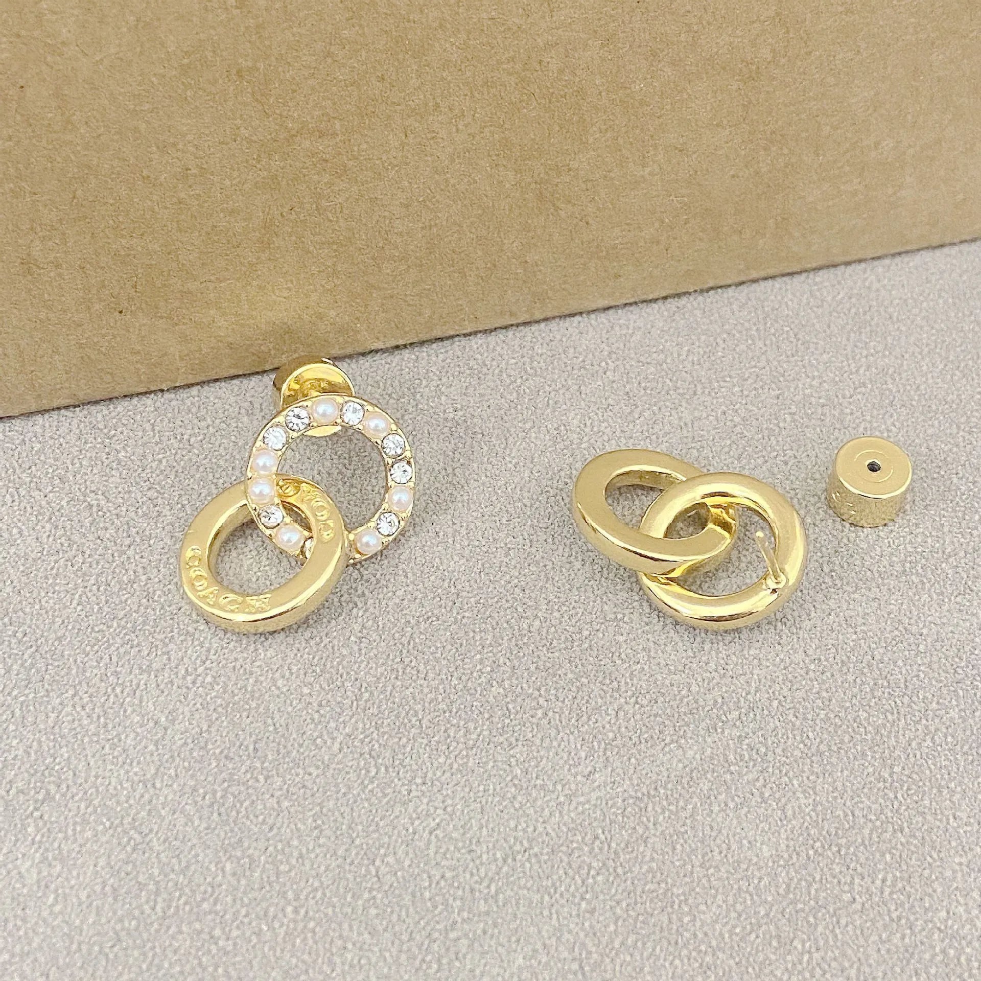 Trainer Luxe Eternity Interlocking Earrings
