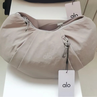 Alo Yoga Pleated Crescent Sling Bag