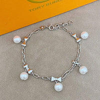 T-Luxe Pearl Bow Charm Bracelet