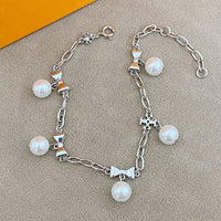 T-Luxe Pearl Bow Charm Bracelet