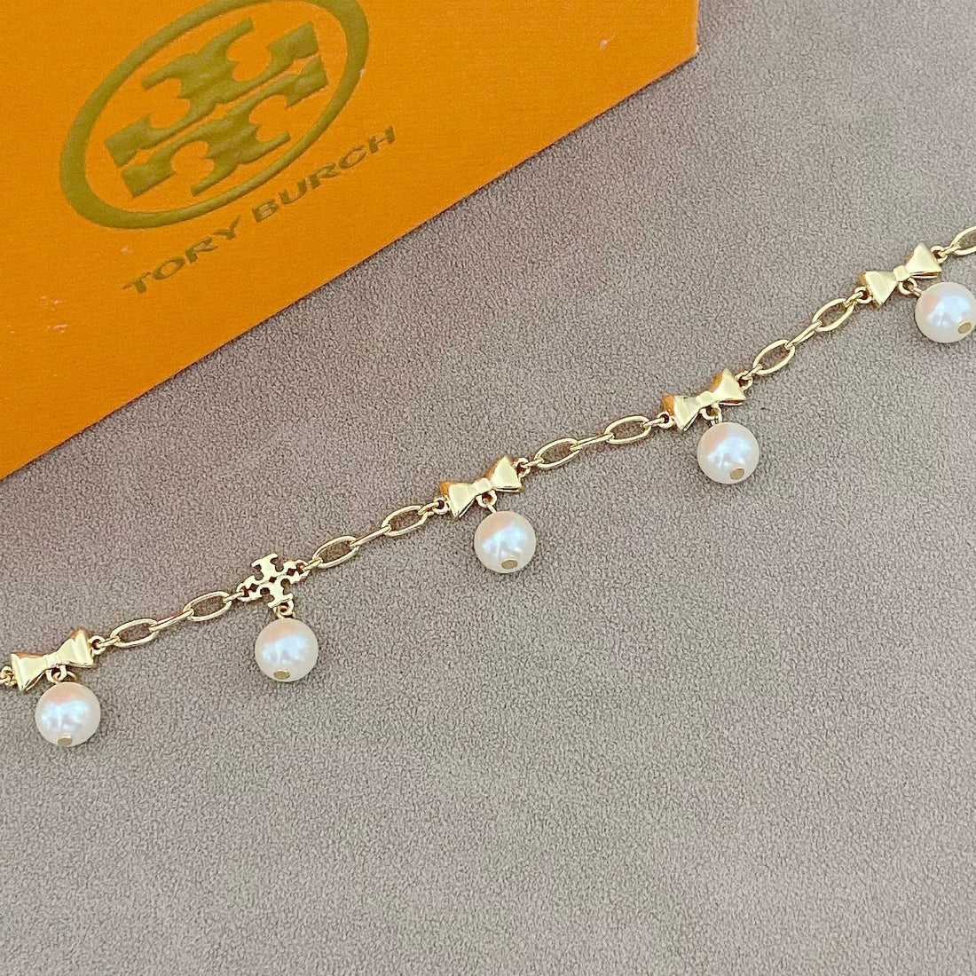 T-Luxe Pearl Bow Charm Bracelet