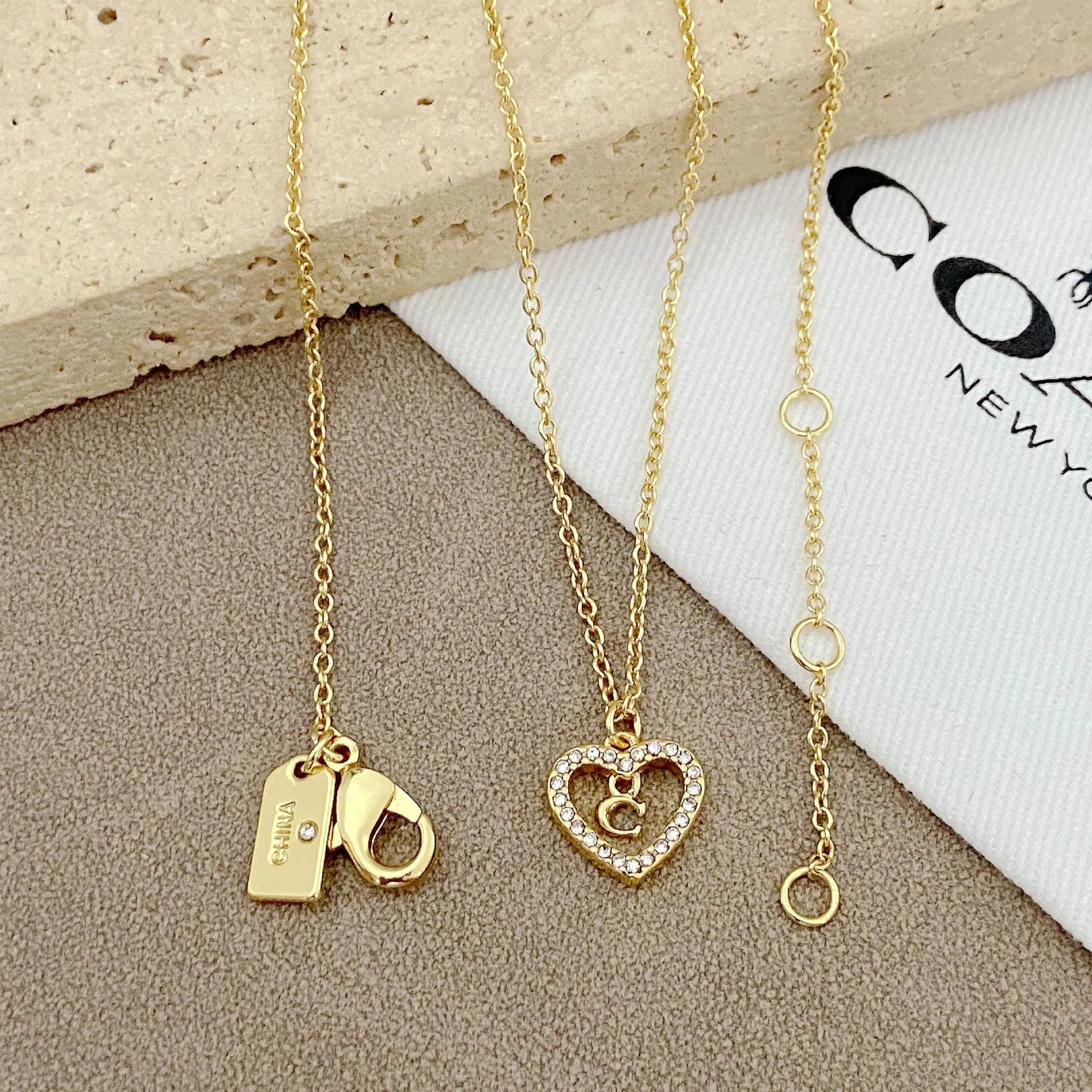 Trainer Luxe Radiant Heart Monogram Pendant