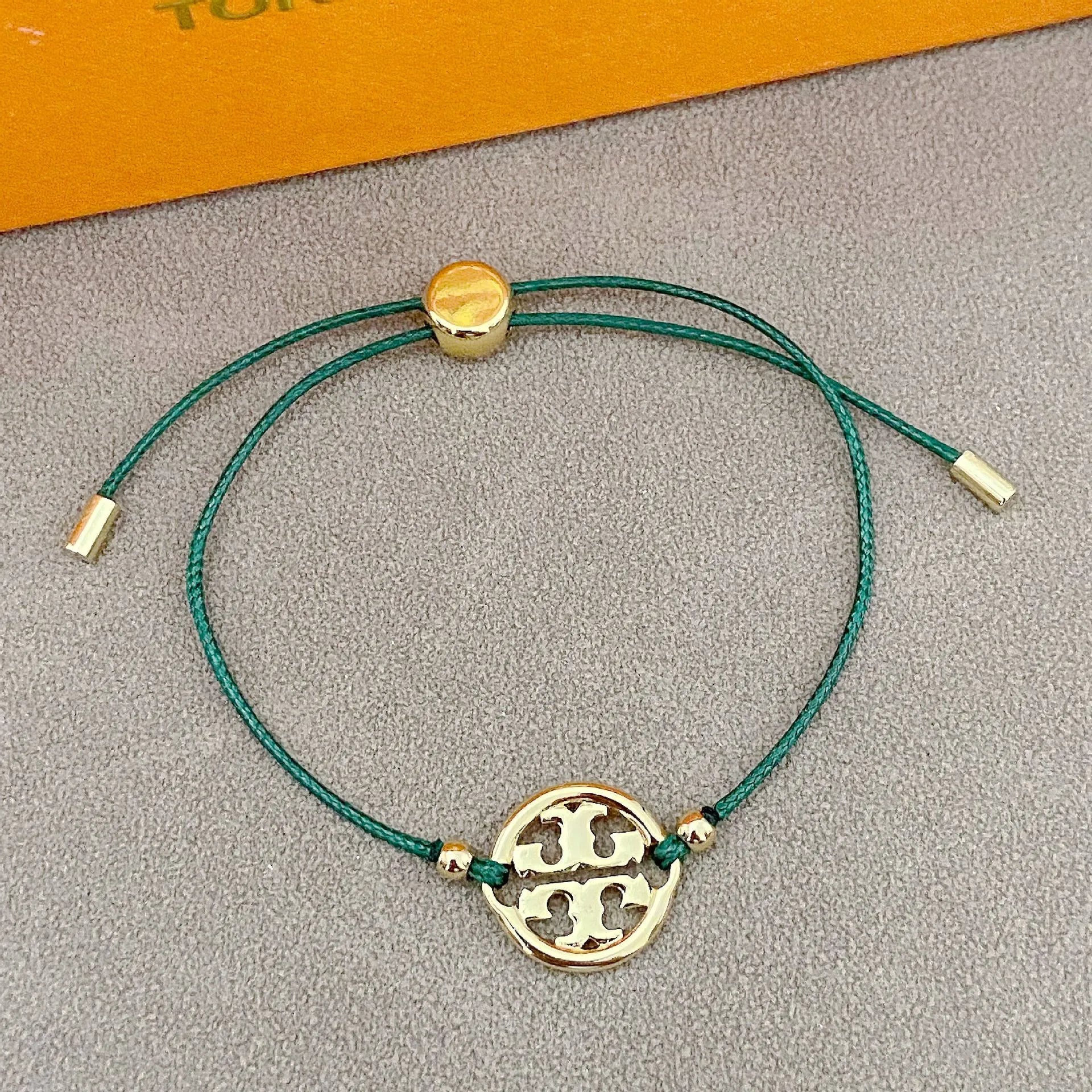 T-Luxe Color Cord Emblem Bracelet