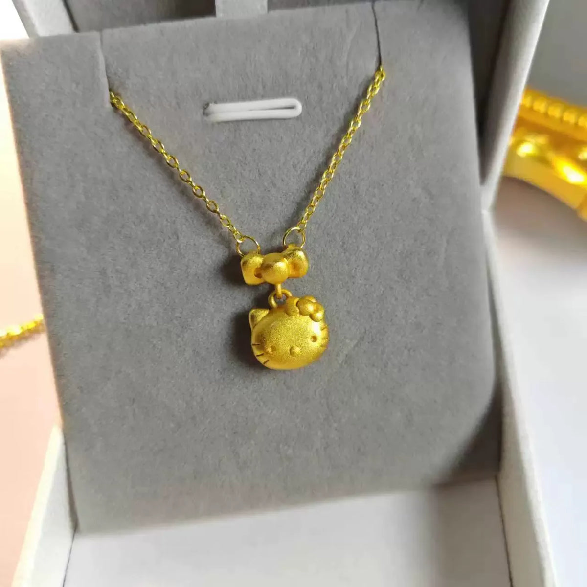 Sanrio Hello Kitty Matte Gold Bow Pendant Necklace