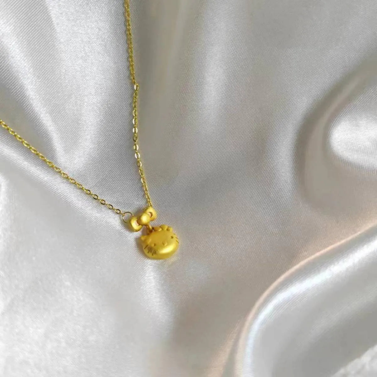 Sanrio Hello Kitty Matte Gold Bow Pendant Necklace