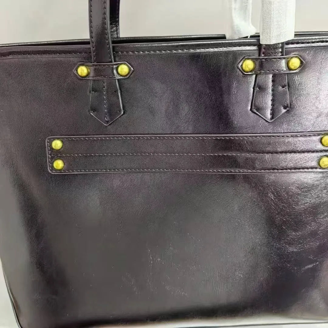 VW Molded Orb Leather Shopper Tote Bag