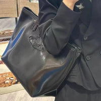 VW Molded Orb Leather Shopper Tote Bag