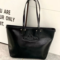VW Molded Orb Leather Shopper Tote Bag