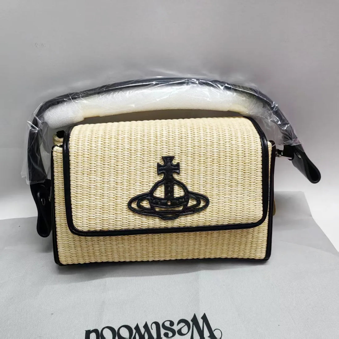VW Embroidered Orb Woven Raffia Flap Baguette
