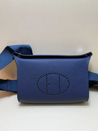 Horse Carriage Perforated Grain Leather Pouch