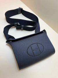 Horse Carriage Perforated Grain Leather Pouch