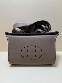 Horse Carriage Perforated Grain Leather Pouch