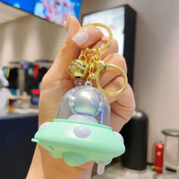 Astronaut Flying Saucer LED Keychain