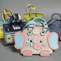 Pendentif mini sac éléphant monogramme 