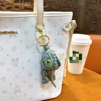 Chomp Champ Dinosaur String Keychain