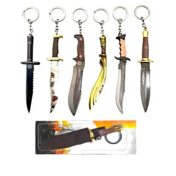 Set of various knife keychains with a display card on a white background