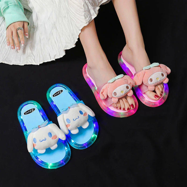 Pink and blue light-up sandals being worn