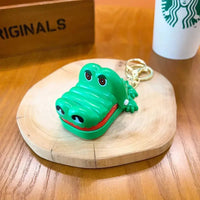 Dino & Croc Finger Game Keychain