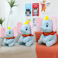Peluche éléphant aux oreilles tombantes 