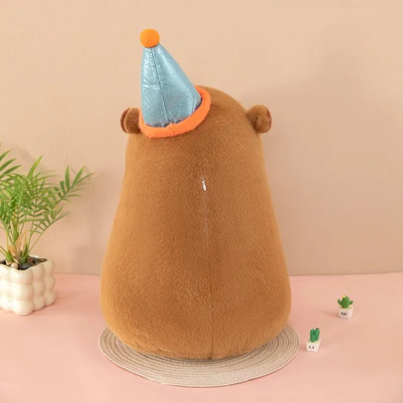 دمية كابيبارا المحشوة بعيد الميلاد السعيد 