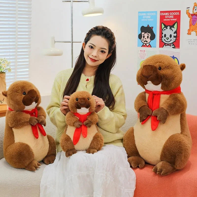 Peluche Castor à écharpe rouge 