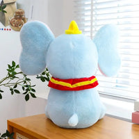 Peluche éléphant aux oreilles tombantes 