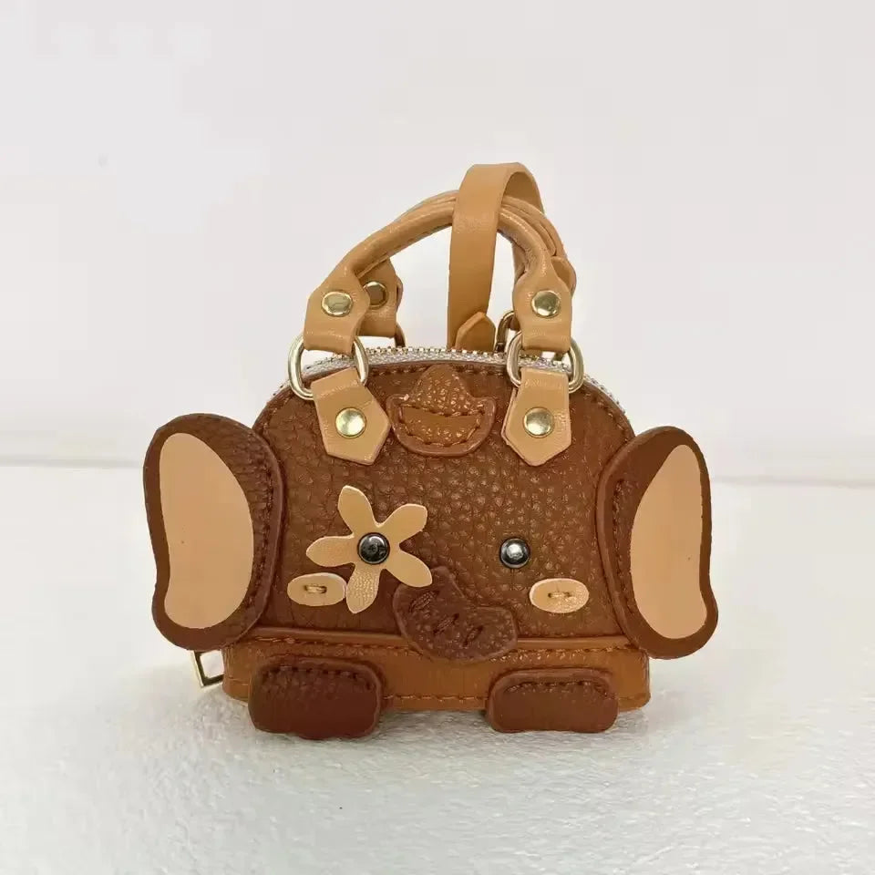 Pendentif mini sac éléphant monogramme 