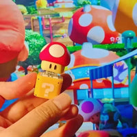 سلسلة مفاتيح على شكل كتلة أسئلة على شكل ضفدع 