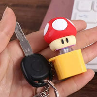 سلسلة مفاتيح على شكل كتلة أسئلة على شكل ضفدع 