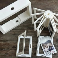 Carrousel de cadres photo rotatifs à 12 emplacements 