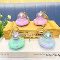 Astronaut Flying Saucer LED Keychain