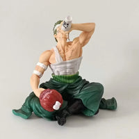 One Piece Injured Drinking Roronoa Zoro Action Figurine (15 cm)