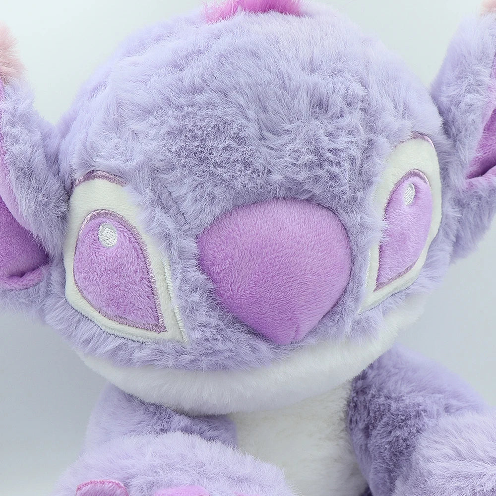 Purple Stitch Plush Doll