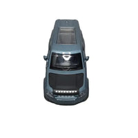 Model car on a concrete floor with a neutral background