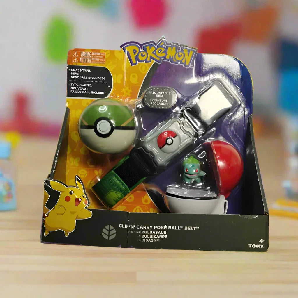 Pokémon Poké Ball belt pack on a grassy surface with a textured wall background