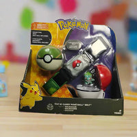 Pokémon Poké Ball belt pack on a grassy surface with a textured wall background