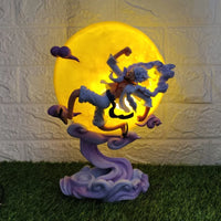 Decorative One Piece Luffy lamp with a dragon design against a textured wall.