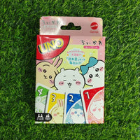 Packaged children's toys with cartoon characters on a grass background