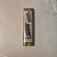 Eraser on a pink marble surface