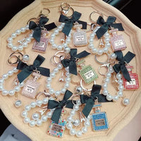 Fancy Looking Perfume Bottle Keychain - Bear Hugs