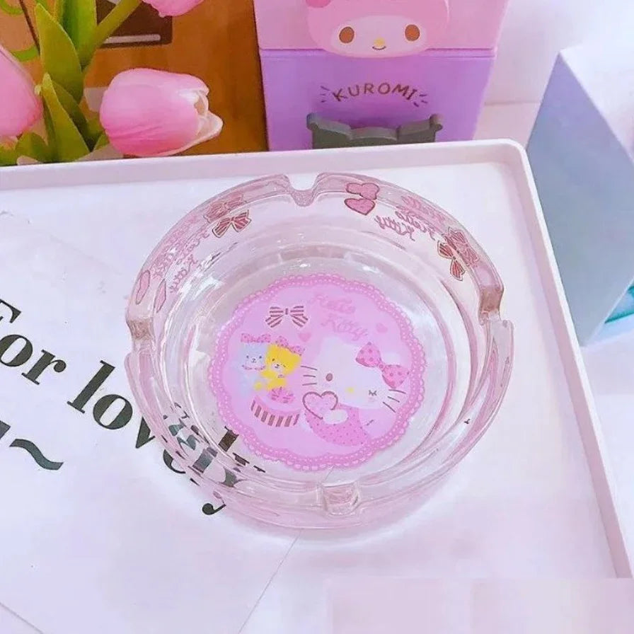 Pink and clear container with cartoon character design on a white surface with tulips in the background.