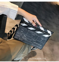 Wonderland Clapperboard Wristlet Clutch