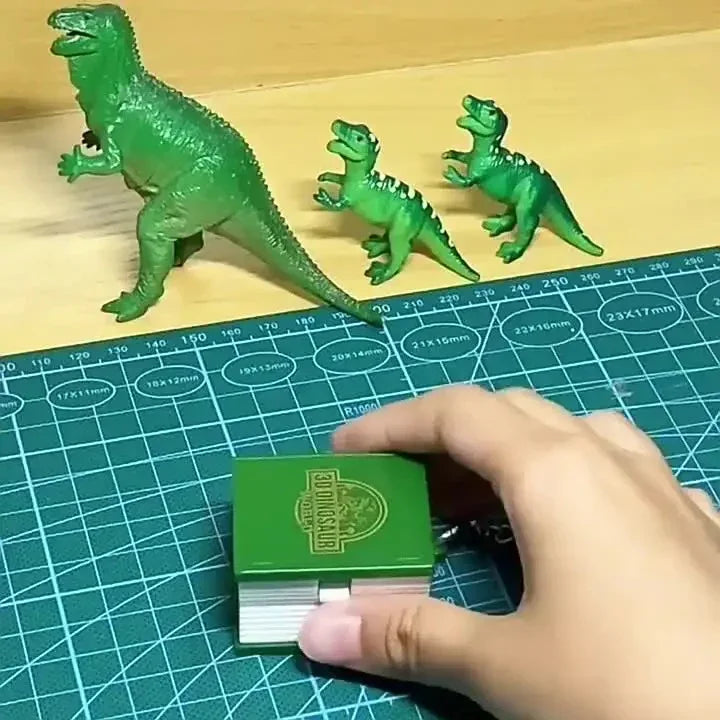 Jurassic Dinosaur Folding Book Keychain