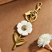 Trainer Luxe TS I Turned Pretty Daisy Bag Charm