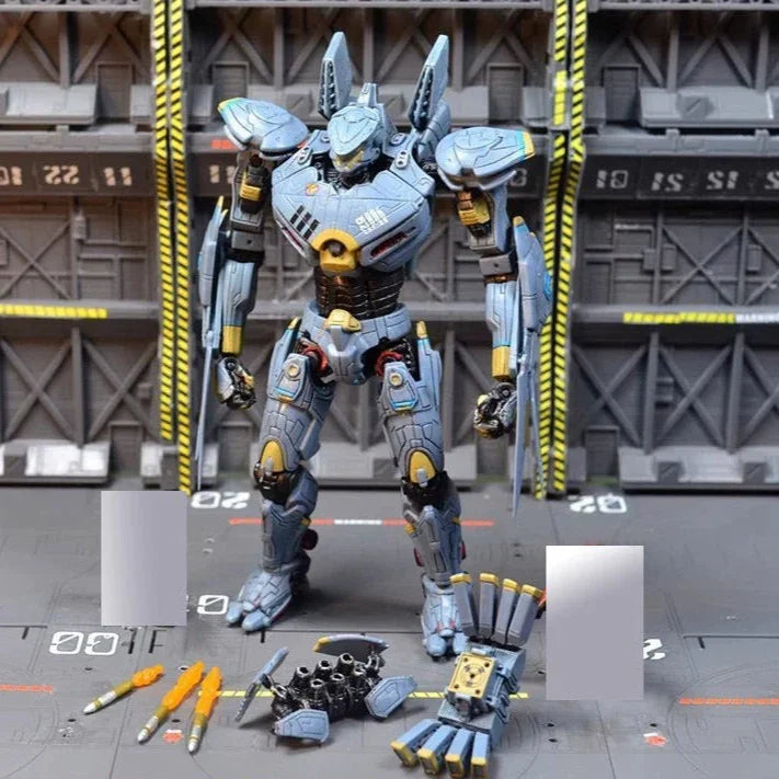 Mechanical toy figure with parts on a gray platform against a industrial background