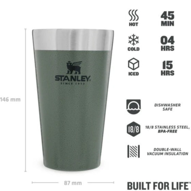 Green Stanley tumbler with product features on a white background