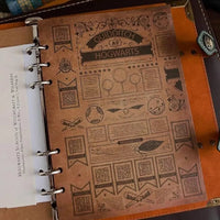 Notebook with 'Quidditch at Hogwarts' design on the cover