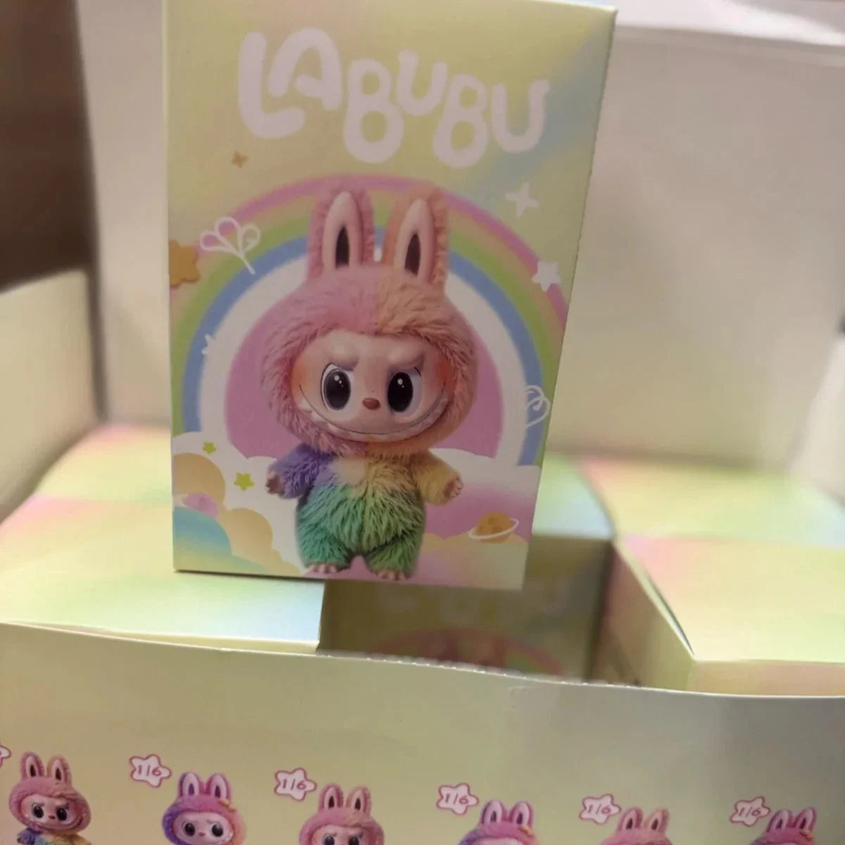 Labubu toy with packaging featuring a colorful design